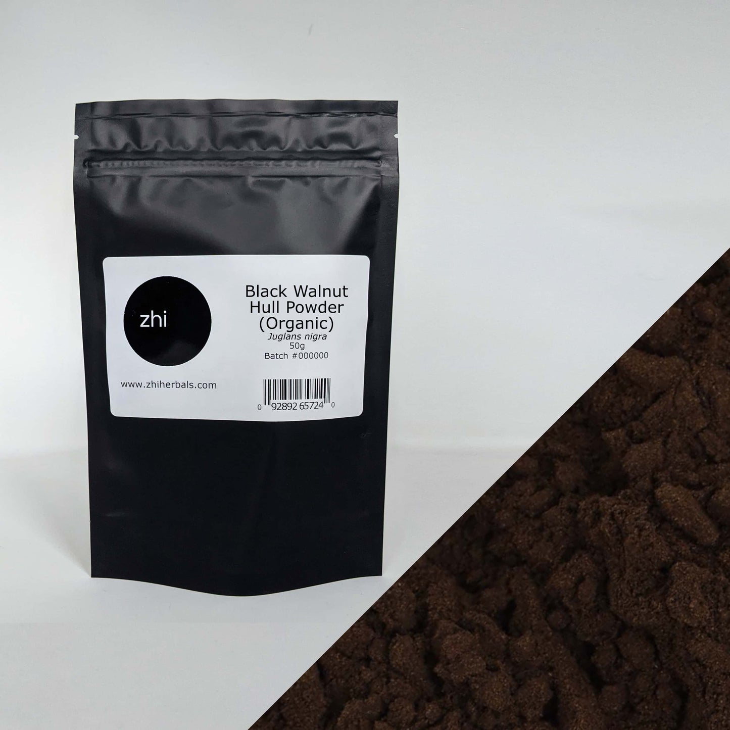 Zhi Herbals Organic Black Walnut Hull Powder, 50g black package with label, next to a close-up of the dark brown powder.