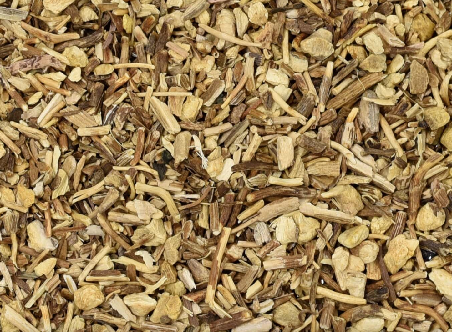 Close-up of dried gravel root, showing brown chopped root pieces used for teas and herbal remedies.