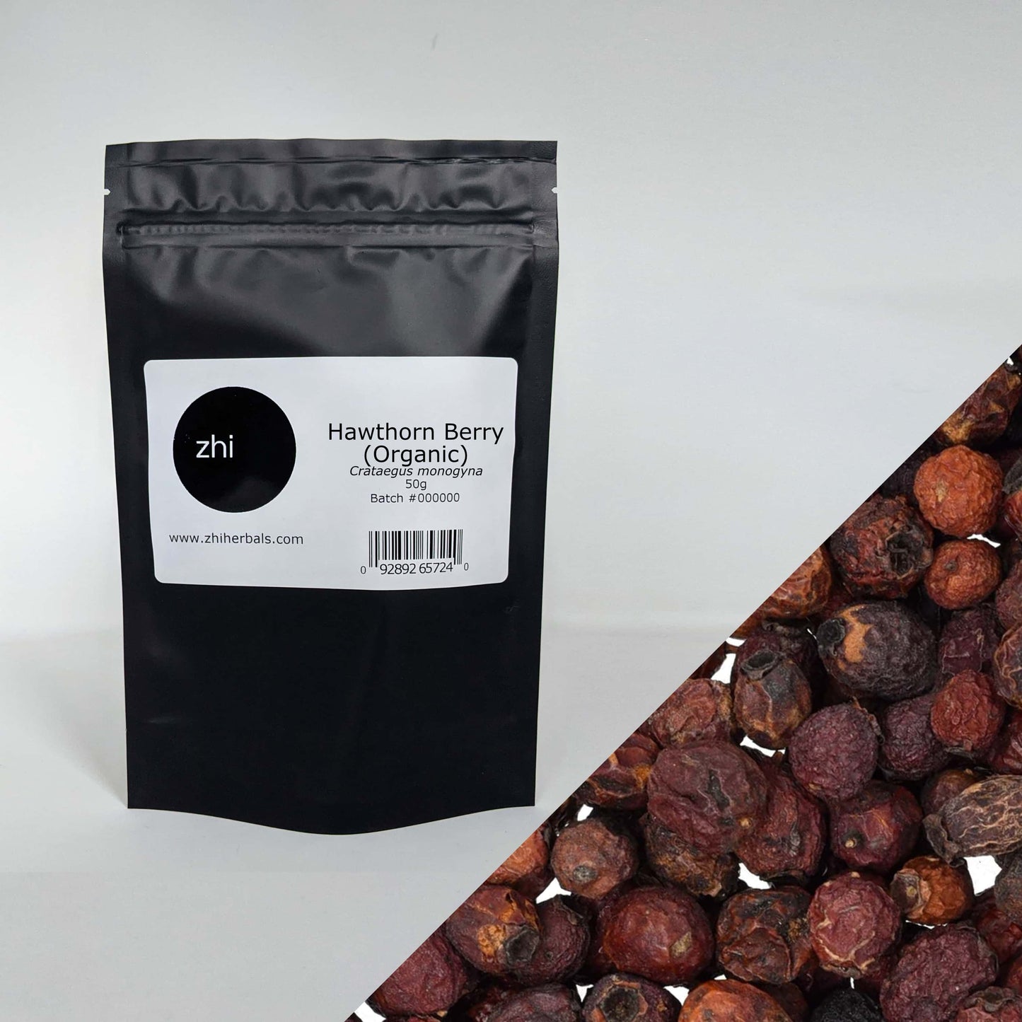 Zhi Herbals Organic Hawthorn Berry, 50g black package with label, next to a close-up of the dark red berries.