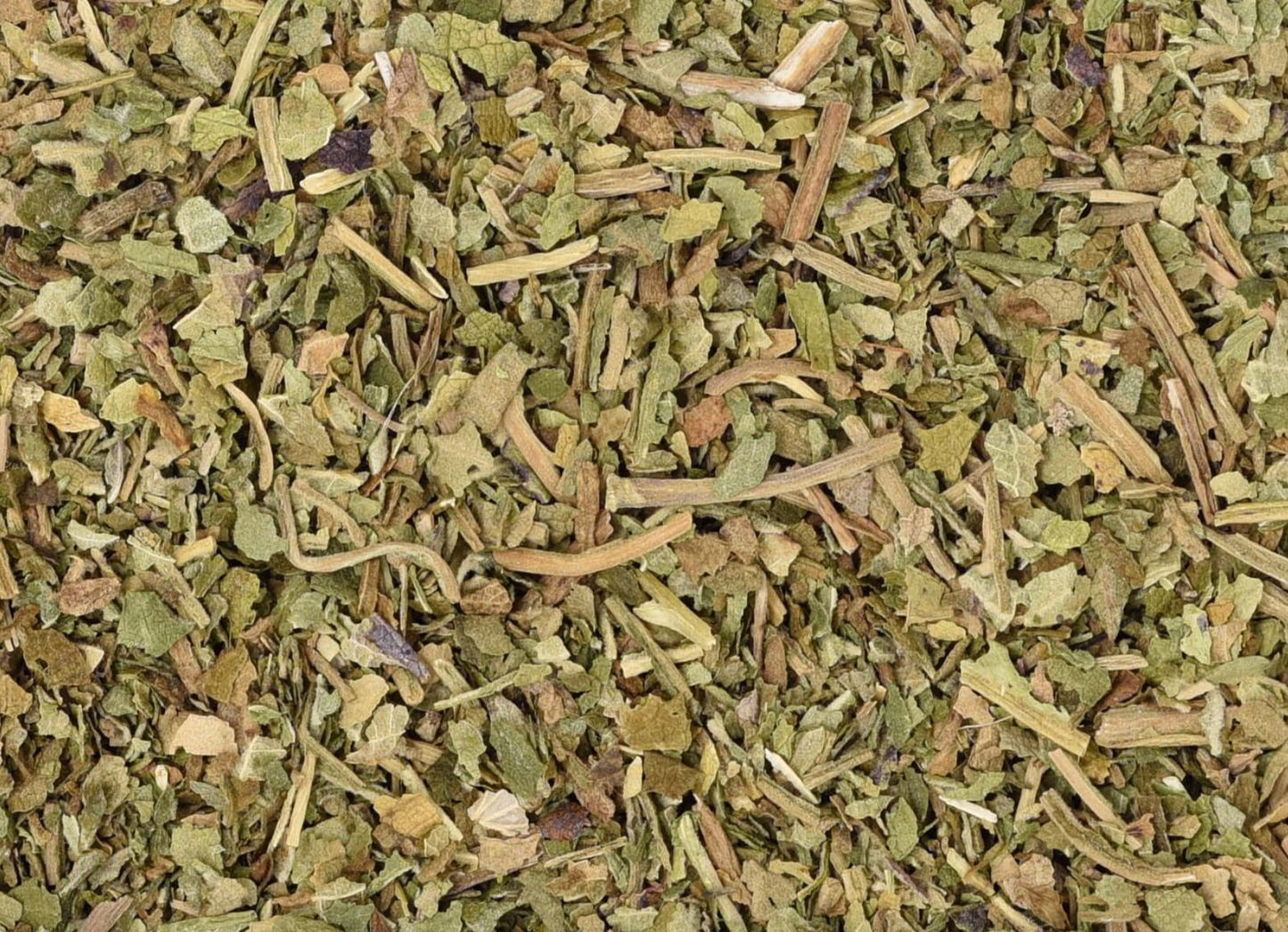 Close-up of dried lobelia herb, showing chopped stems, leaves, and pieces used for teas and herbal remedies.