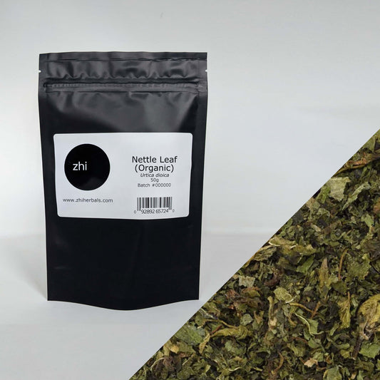 Zhi Herbals Organic Nettle Leaf, 50g black package with label, next to a close-up of the green leaf texture.