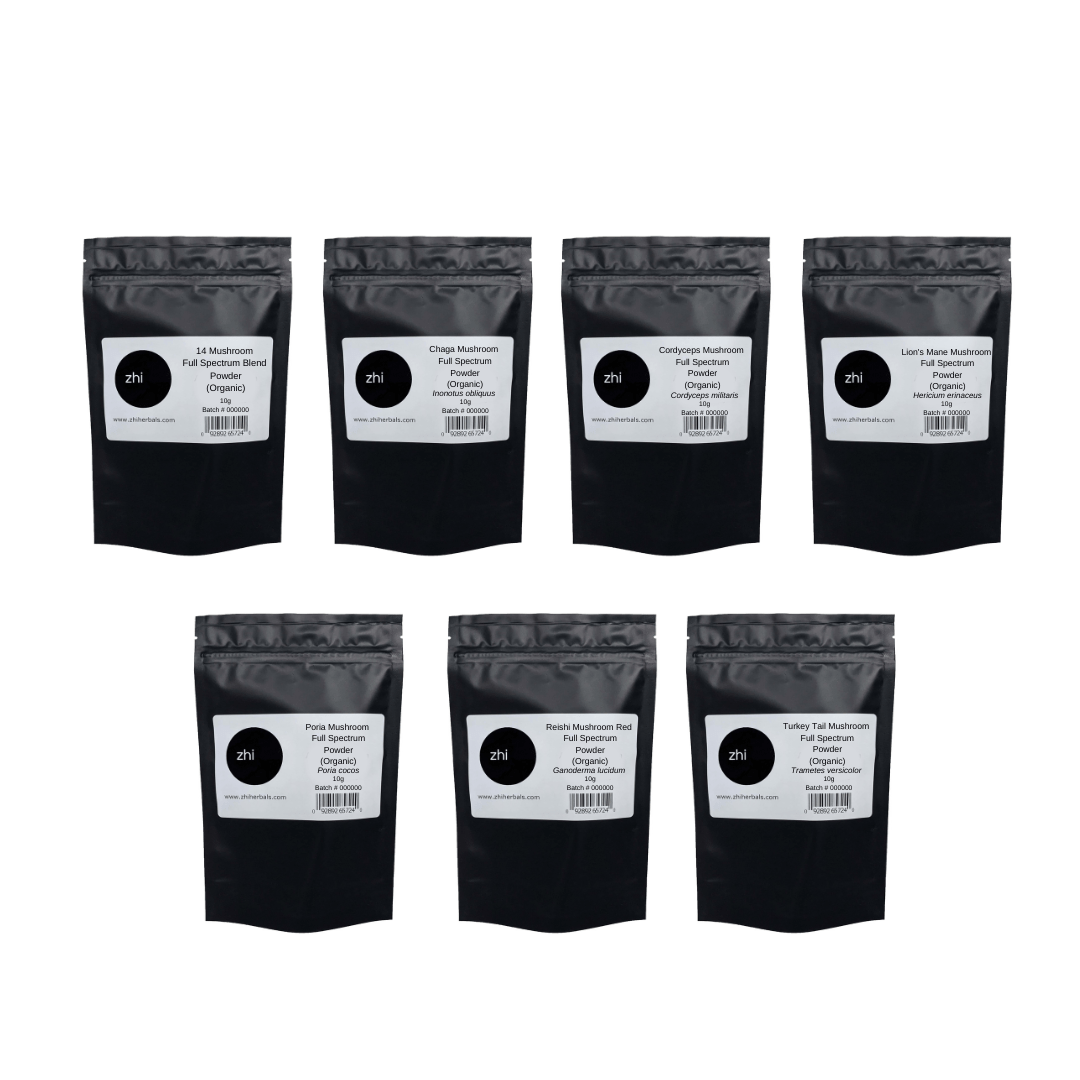 Seven Zhi Herbals mushroom powders (Organic) in black resealable bags with product labels and barcodes.